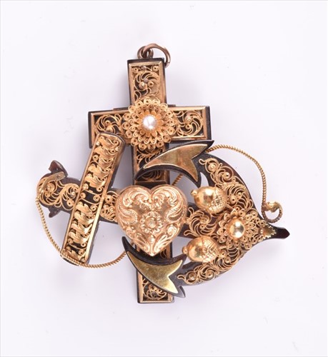 Lot 596 - An unusual tortoiseshell and yellow metal...