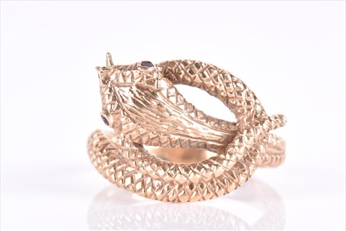 Lot 600 - An unusual 9ct yellow gold snake ring with...