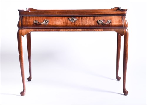 Lot 5 - A Georgian mahogany veneer silver table the...