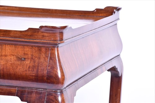 Lot 5 - A Georgian mahogany veneer silver table the...