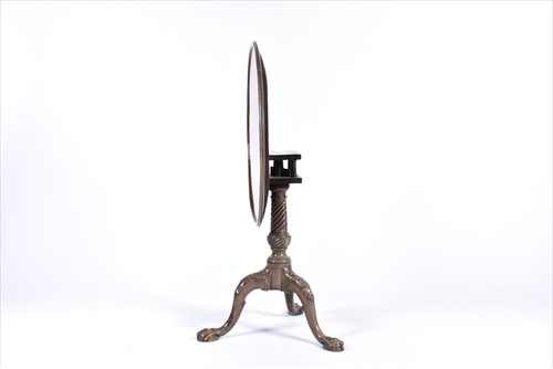 Lot 55 - A Georgian mahogany tilt-top table with...