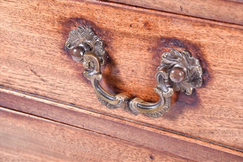 Lot 53 - A Georgian straight fronted mahogany chest of...