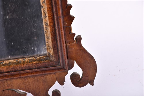 Lot 67 - A late Georgian mahogany fret mirror designed...