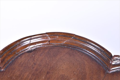 Lot 57 - A Victorian carved mahogany tripod side table...