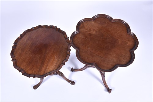 Lot 57 - A Victorian carved mahogany tripod side table...