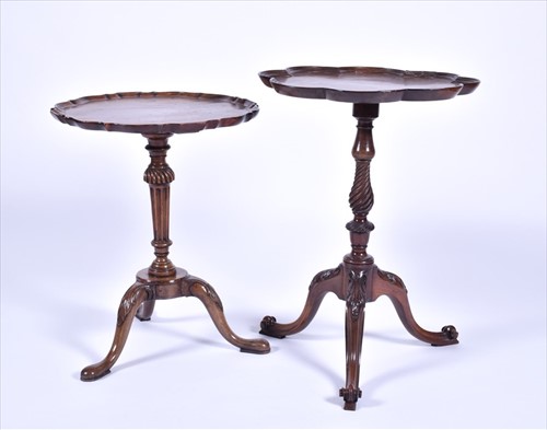 Lot 57 - A Victorian carved mahogany tripod side table...