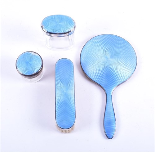 Lot 393 - An enamel and silver dressing table set...