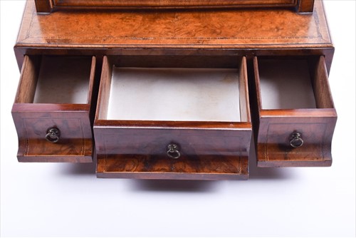 Lot 45 - A Queen Anne burr walnut dressing mirror the...