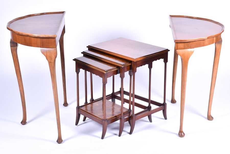 Lot 47 - A burr walnut quarter veneered nest of tables...