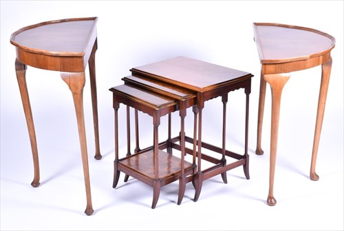 Lot 47 - A burr walnut quarter veneered nest of tables...