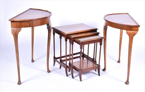 Lot 47 - A burr walnut quarter veneered nest of tables...