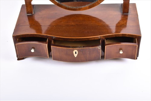 Lot 49 - An Edwardian mahogany and strung toilet mirror...