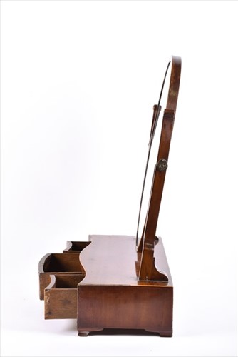 Lot 49 - An Edwardian mahogany and strung toilet mirror...