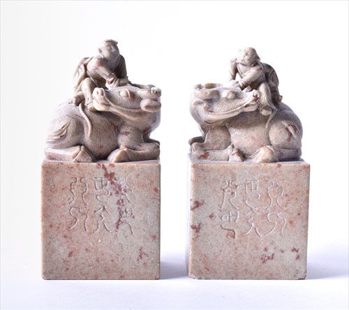 Lot 181 - A pair of Chinese carved soapstone seals each...