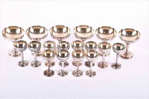 Lot 483 - A set of six French silver coupesÂ  with shell...