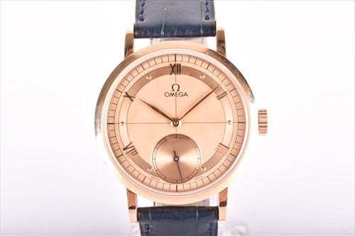 Lot 420 - A fine and rare 18ct gold rose gold Omega 1894...