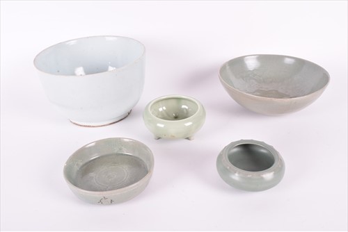 Lot 182 - A group of five Korean celadon pottery bowls...