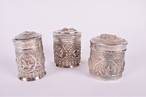Lot 486 - An Eastern cylindrical shaped white metal...