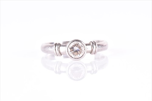 Lot 572 - A platinum and diamond solitaire ring...