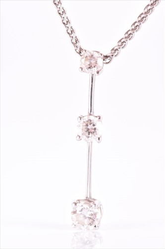Lot 571 - A white gold and diamond pendant the...