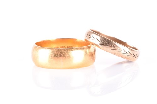 Lot 559 - A 22ct yellow gold wedding band ring fully...