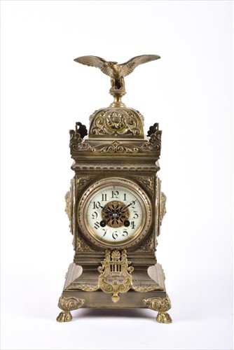 Lot 379 - A Victorian brass chiming mantle clock with...