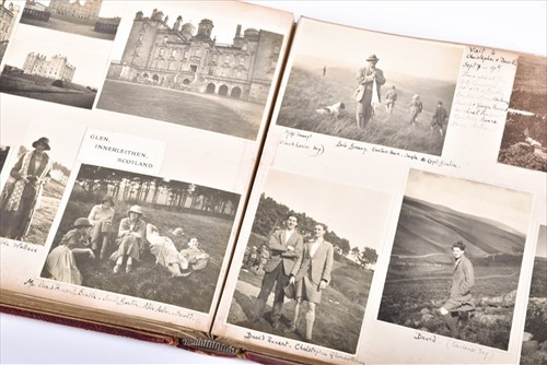 Lot 348 - An early 20th century photograph album of...