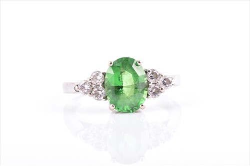 Lot 692 - An 18ct white gold, diamond, and tsavorite...