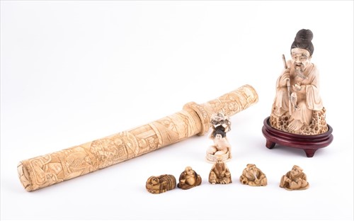 Lot 199 - A Meiji period ivory okimono of a fisherman...