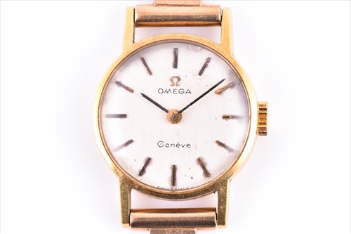 Lot 446A - Omega. A ladies yellow metal wristwatch with...