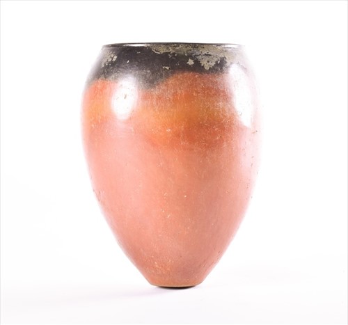 Lot 241 - A large Egyptian black-topped pottery jar...