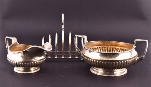 Lot 476 - A late Victorian silver six-slice toast rack...
