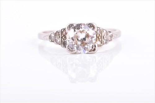 Lot 573 - An Art Deco platinum and diamond solitaire...