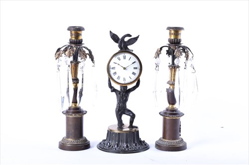 Lot 416 - A small Regency style clock garniture with...