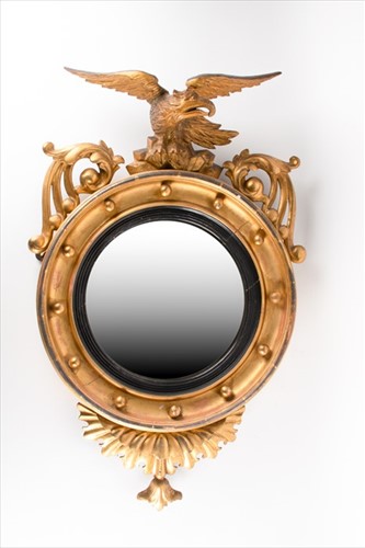 Lot 120 - A Regency giltwood convex wall mirror the...