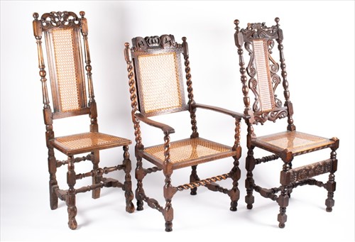 Lot 77 - Two 17th century style carved oak side chairs...