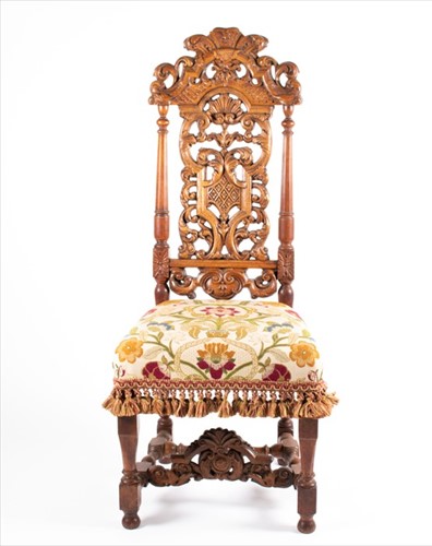 Lot 89 - A 17th century style carved and pierced back...