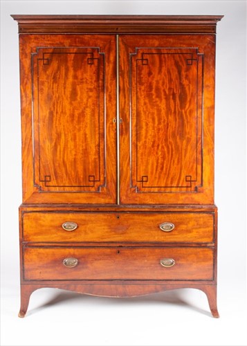 Lot 82 - A 19th century mahogany and inlaid linen press...