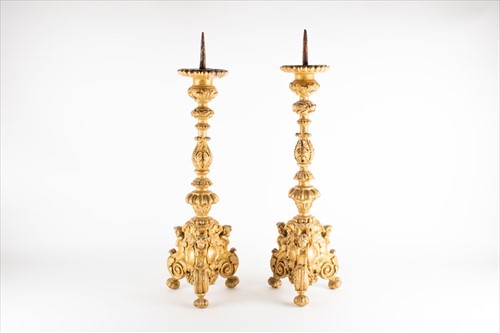 Lot 213 - A pair of 19th century giltwood pricket...