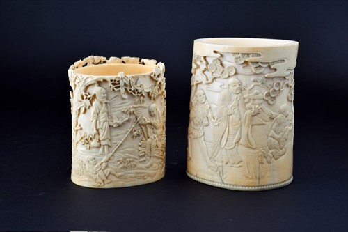 Lot 159 - A Meiji period ivory brush pot carved...