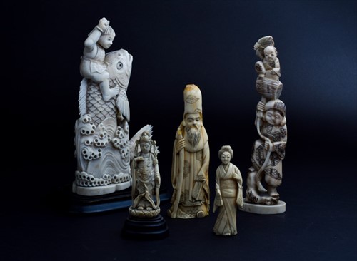 Lot 160 - A late Meiji period ivory okimono modelled as...