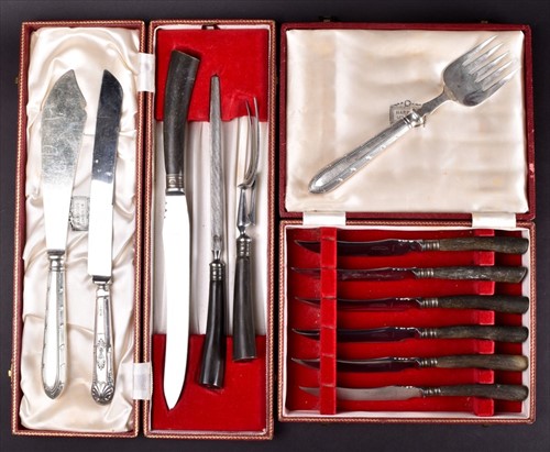 Lot 393 - A cased set of Harrods carving knives with...