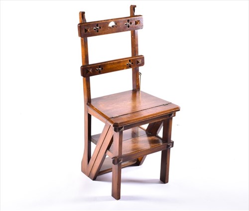 Lot 94 - An early 20th century oak metamorphic library...