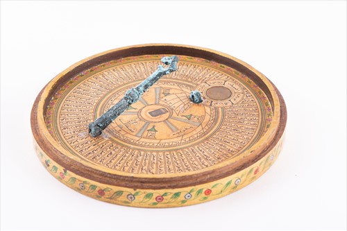 Lot 160 - A Persian lacquer Qibla indicator and sundial...