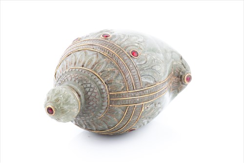 Lot 259 - A Mughal style celadon jade scent bottle, of...