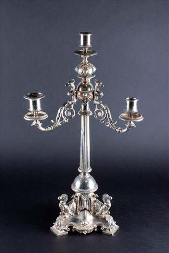 Lot 376 - A Victorian silver-plated three branch...