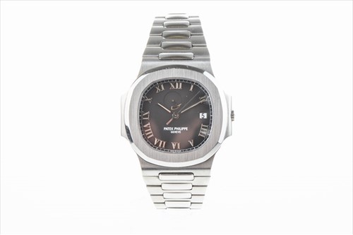 Lot 311 - A fine and rare Patek Philippe Nautilus Ref....