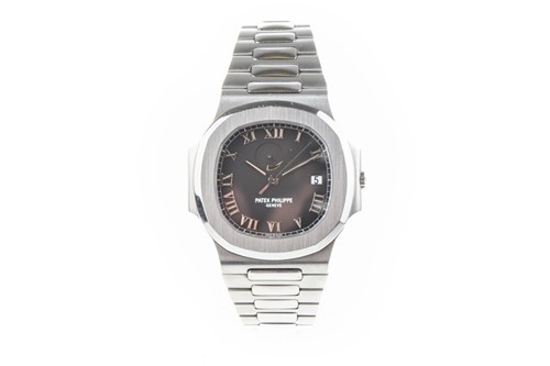 Lot 311 - A fine and rare Patek Philippe Nautilus Ref....