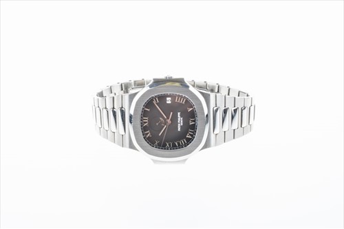 Lot 311 - A fine and rare Patek Philippe Nautilus Ref....