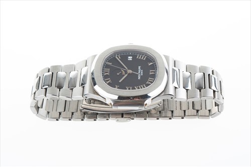 Lot 311 - A fine and rare Patek Philippe Nautilus Ref....